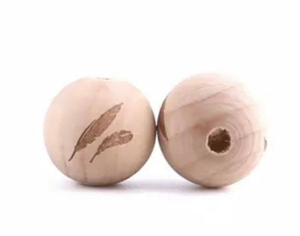 1 Perle 2cm Ahorn mit Federn