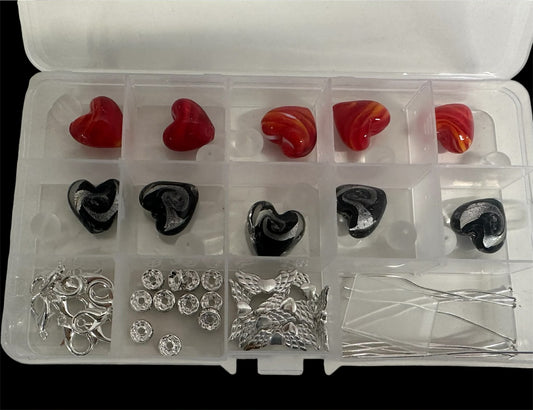 10 Muranoglas Herzperlen Engeli schwarz/rot (A25)